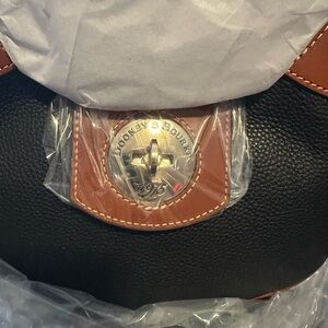 Dooney & Bourke Black Pebbled Leather Hobo with Brown Trim and Gold Hardware
